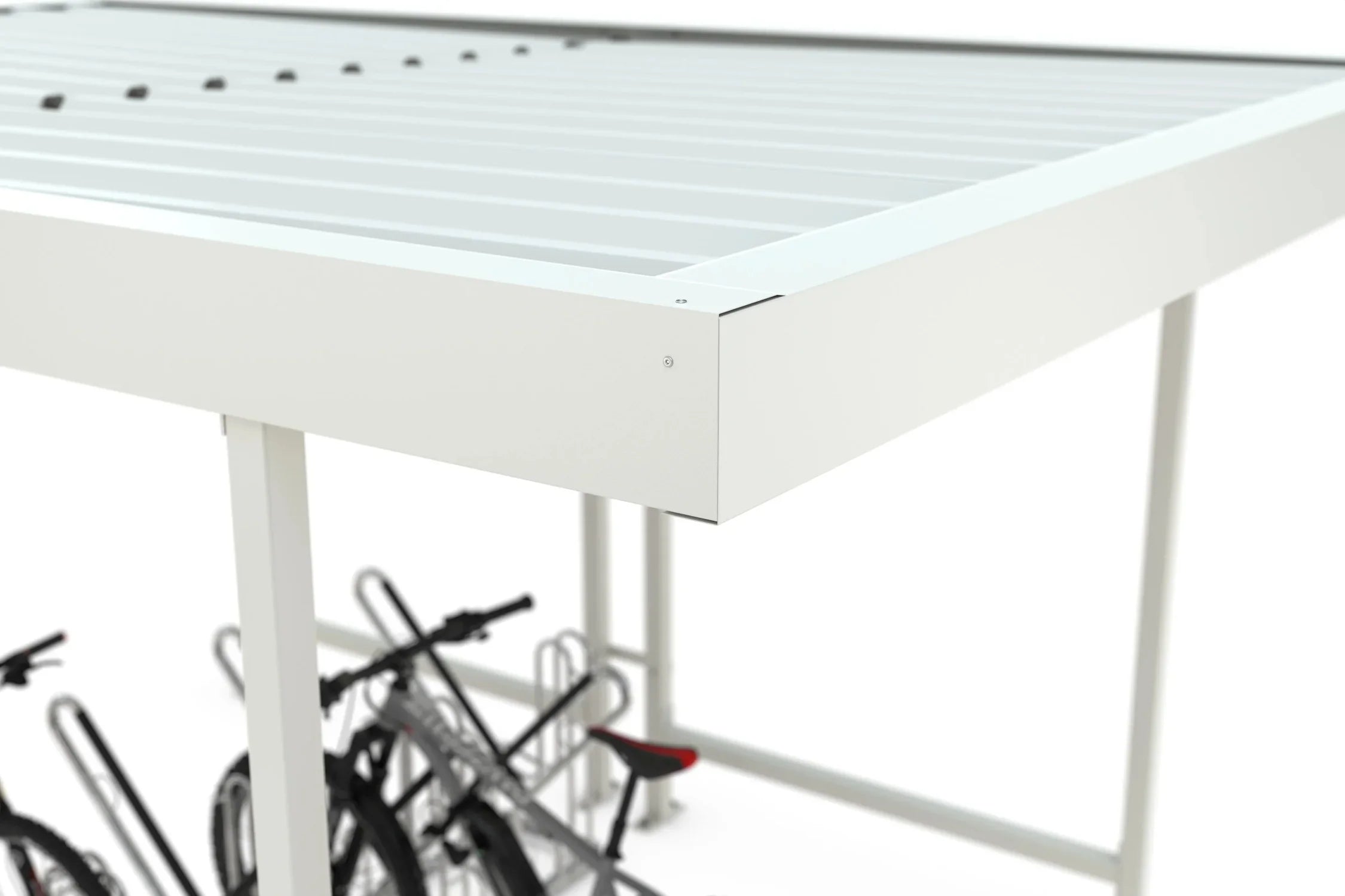 Detailansicht weißer Metallunterstand mit Flachdach und Fahrradständern darunter