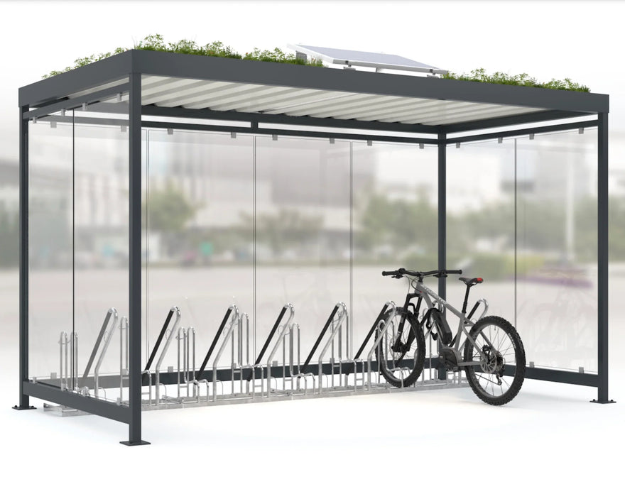 Überdachte Fahrradunterstand mit Glaswänden, integriertem Fahrradständer und Dachbegrünung