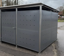 Moderne Metallunterstand mit Lochblech, ideal für Fahrradabstellplatz oder Einbruchschutz