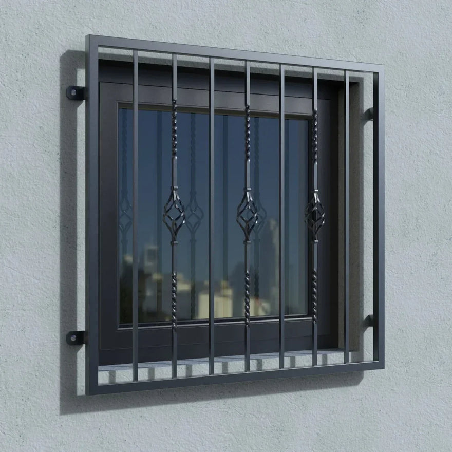 Modernes Fenstergitter RAL 7016 anthrazit aus Metall mit Zierelementen, an Hauswand montiert