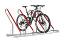 Fahrradparksystem aus Metall mit roten Haltebügeln, Mountainbike eingespannt